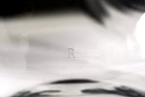 'R' showing in upright (sober) position.